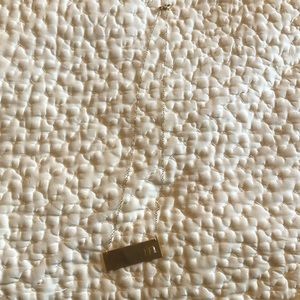 Jennifer Zeuner “M” Gold Bar Necklace